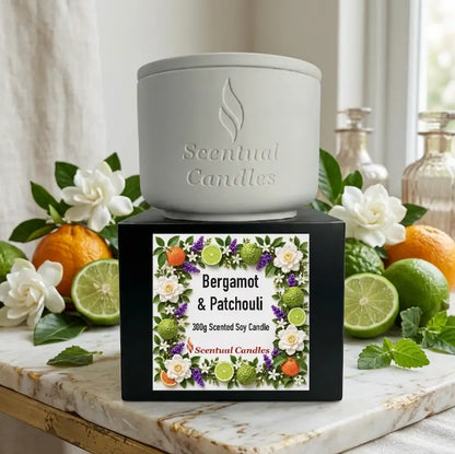 Bergamot Candle with Patchouli in a stylish container by Scentual Candles, featuring a floral design and earthy vibes.