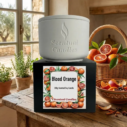 Blood Orange Candle in a stylish container with vibrant blood orange fruit design, showcasing a premium scented soy product.