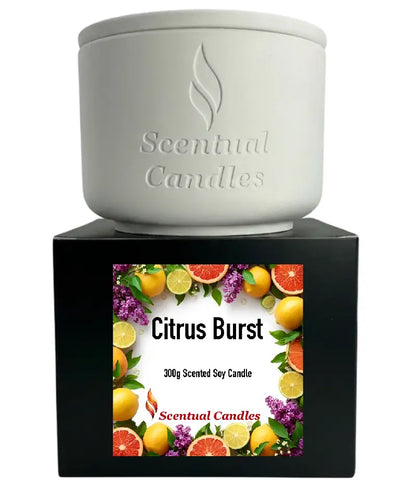 Citrus Candle in a white container with vibrant fruity label showcasing Citrus Burst scent.