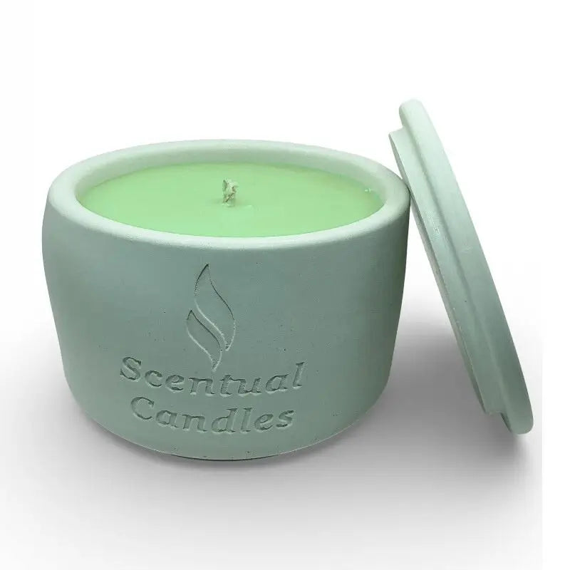 Cucumber and Melon Scented Soy Candle in elegant green jar, open lid, evokes refreshing melon and cucumber fragrance.