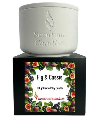 Fig and Cassis scented soy candle in a white container on a black box, showcasing summer fruit aromas.