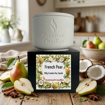 French Pear Candle in a stylish white container with a decorative box featuring pear illustrations.