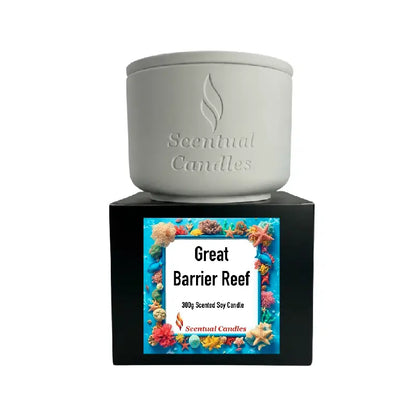 Tropical Scented Candle Great Barrier Reef in a decorative container with colorful marine designs.