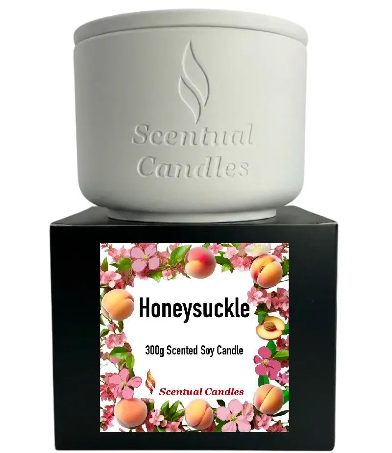 Honeysuckle Scented Candle in a white container, featuring floral design and label with 300g description.
