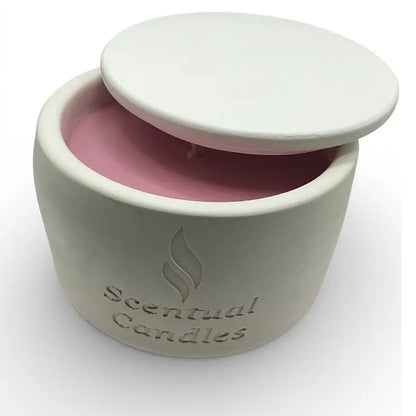 Pink Lychee scented candle in a white container with 'Scentual Candles' branding on a white background