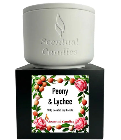 Lychee Scented Candle in a white container with Peony and Raspberries label, showcasing a vibrant design.