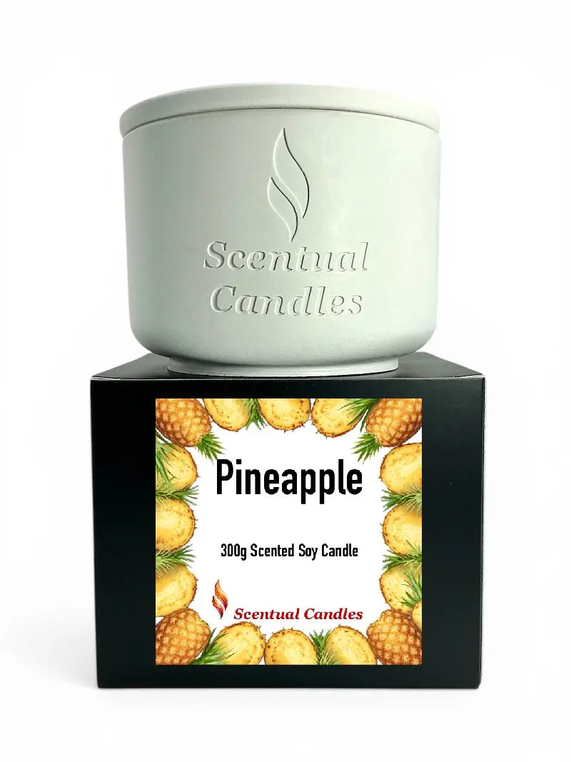 Pineapple Scented Soy Candle in white container with black box featuring pineapple design and label.