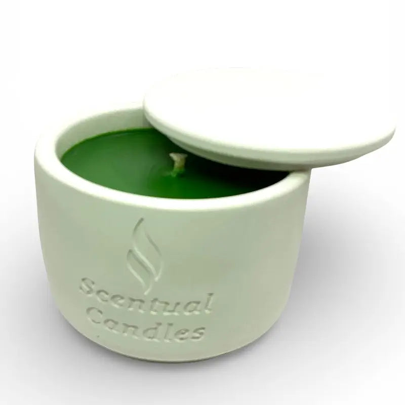 Rainforest Scented Candle in white ceramic jar with lid, green wax inside