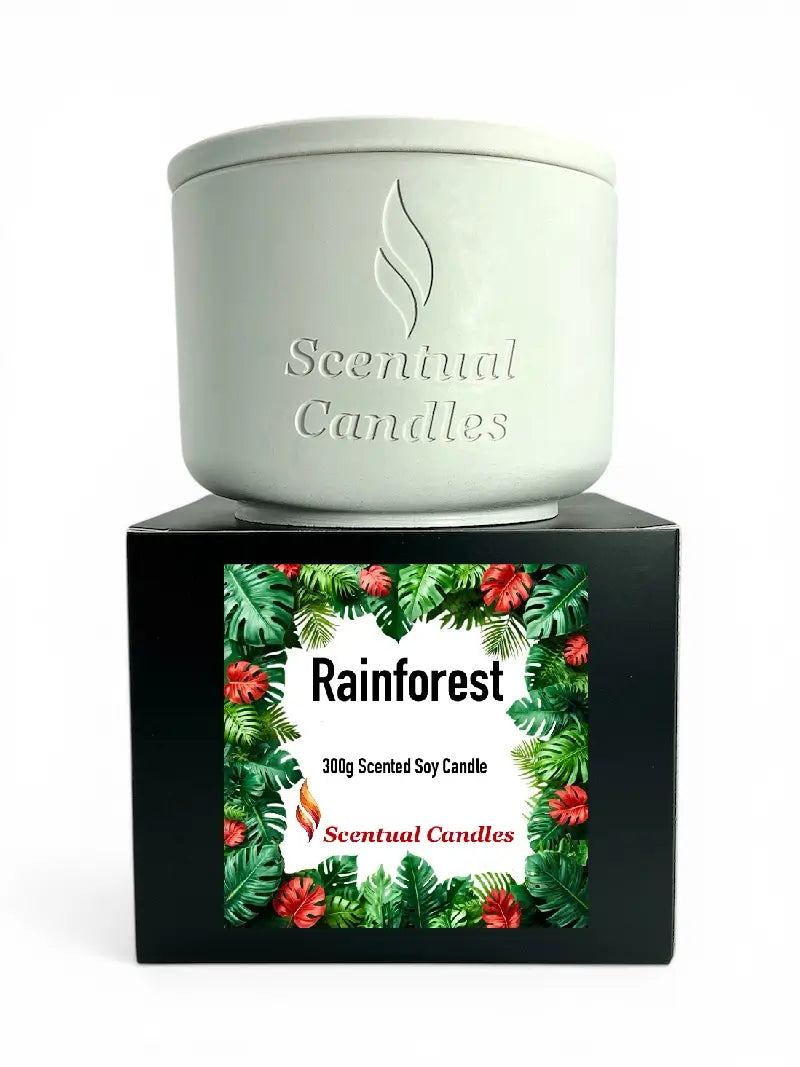 Rainforest Scented Candle in a white ceramic jar with floral packaging, 300g scented soy candle from Scentual Candles.