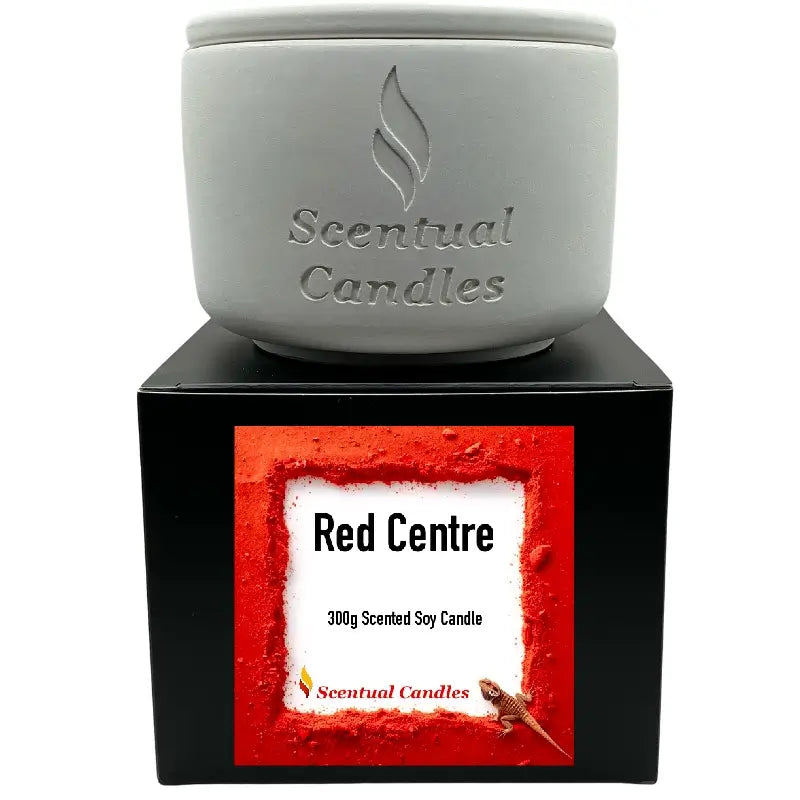 Spicy Vanilla and Buddhawood Red Centre Candle in decorative jar.
