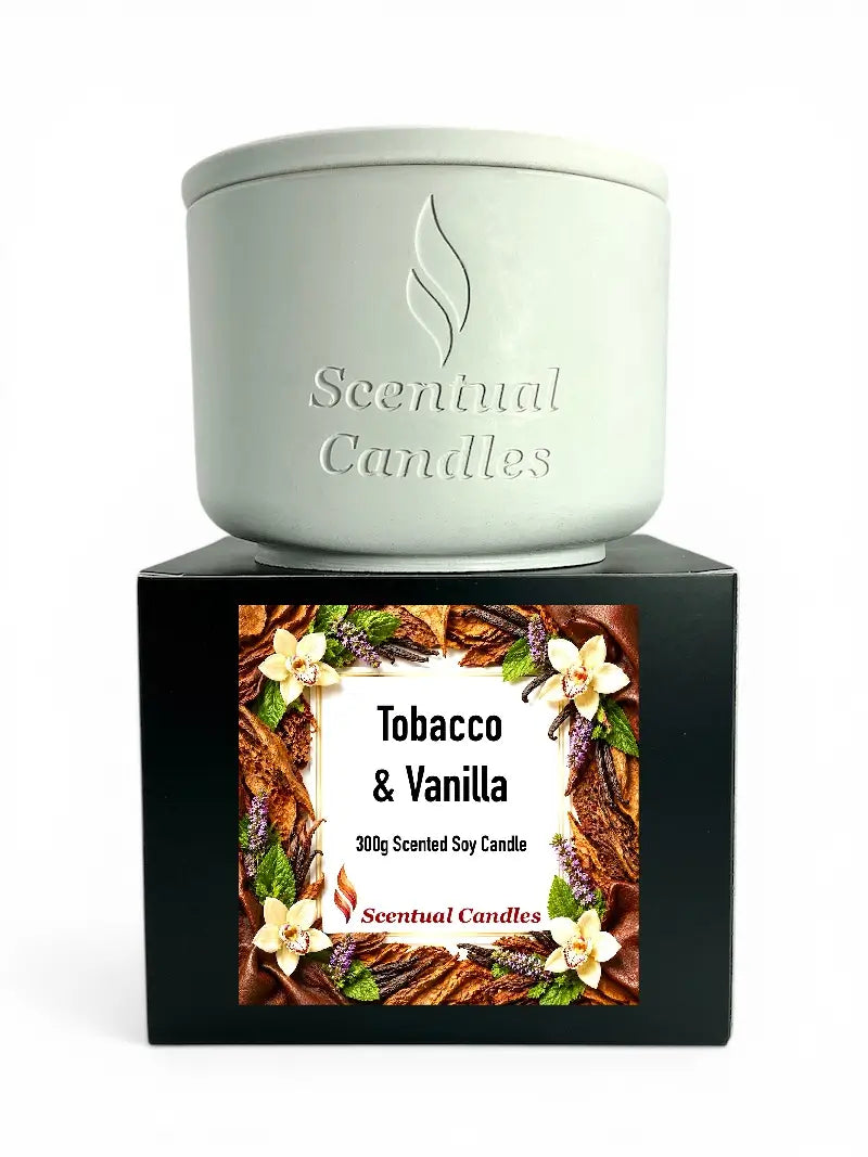 Tobacco Scented Candle displayed with a creamy vanilla label on a black box, elegant design by Scentual Candles.