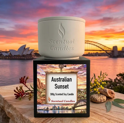 Australian Sunset scented soy candle by Scentual Candles with Sydney Opera House in the background, showcasing a warm sunset.
