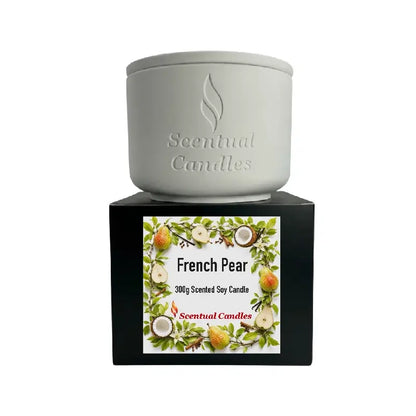 French Pear Candle in a stylish white container with a decorative box featuring pear illustrations.
