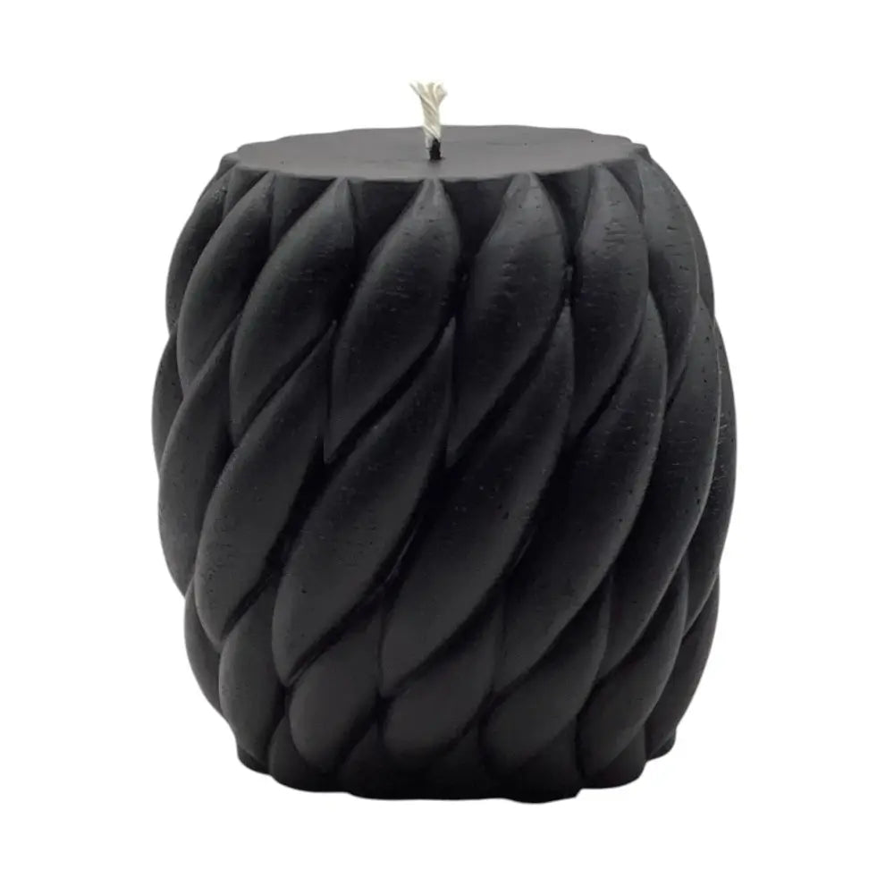 Black braided candle on a white background