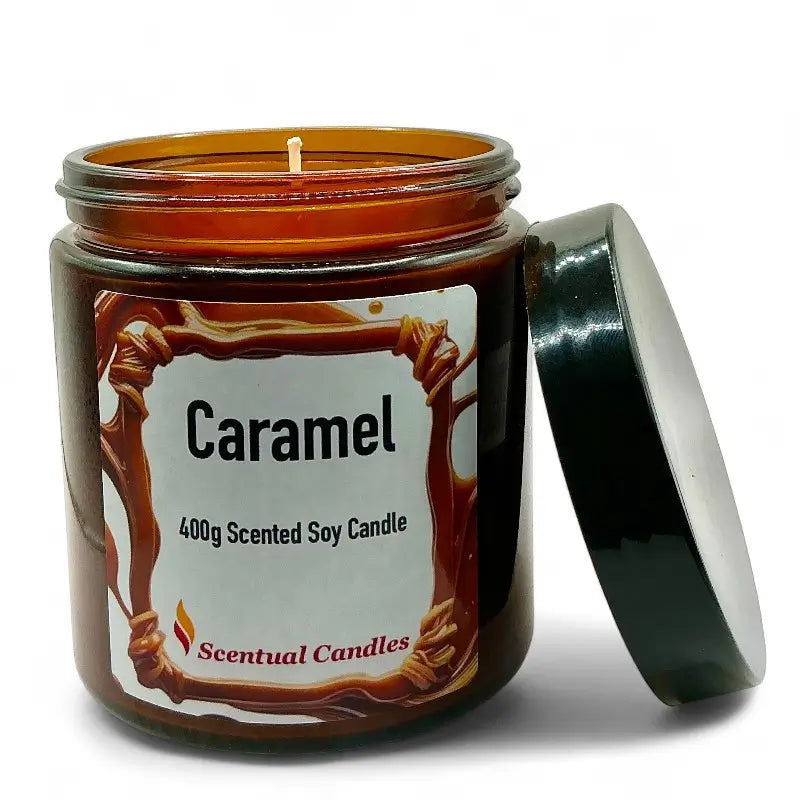 Caramel candle in a glass jar with a label on a white background