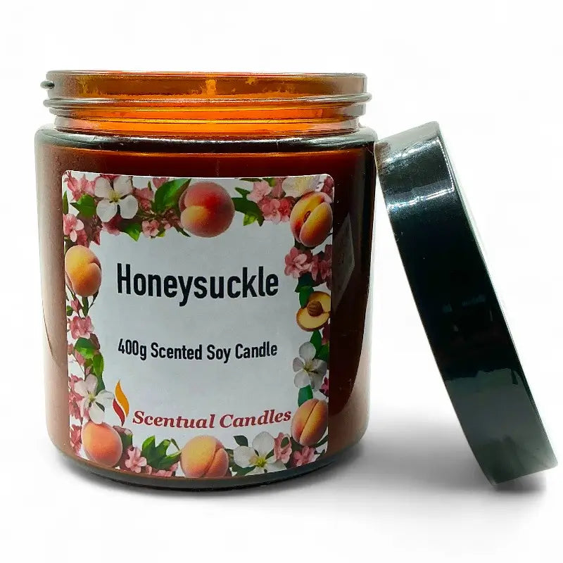 Honeysuckle scented candle with floral and fruit design on label