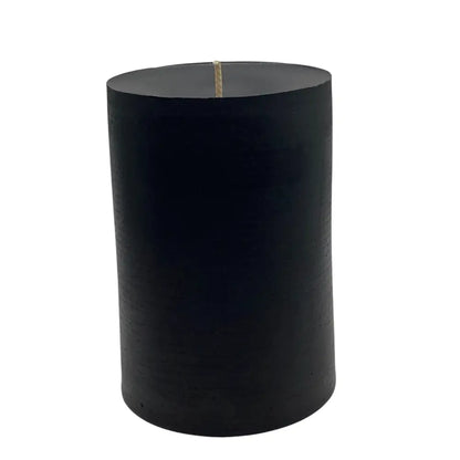 cylindrical black vanilla candle  on a white background