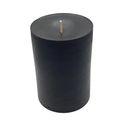 Black Vanilla pillar candle on white background
