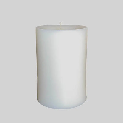 White Pillar Candles with coconut and lime scent, perfect for a tropical ambiance at home.