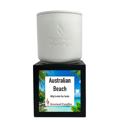 Australian Beach scented soy candle with a clean white container and vibrant packaging featuring beach imagery.