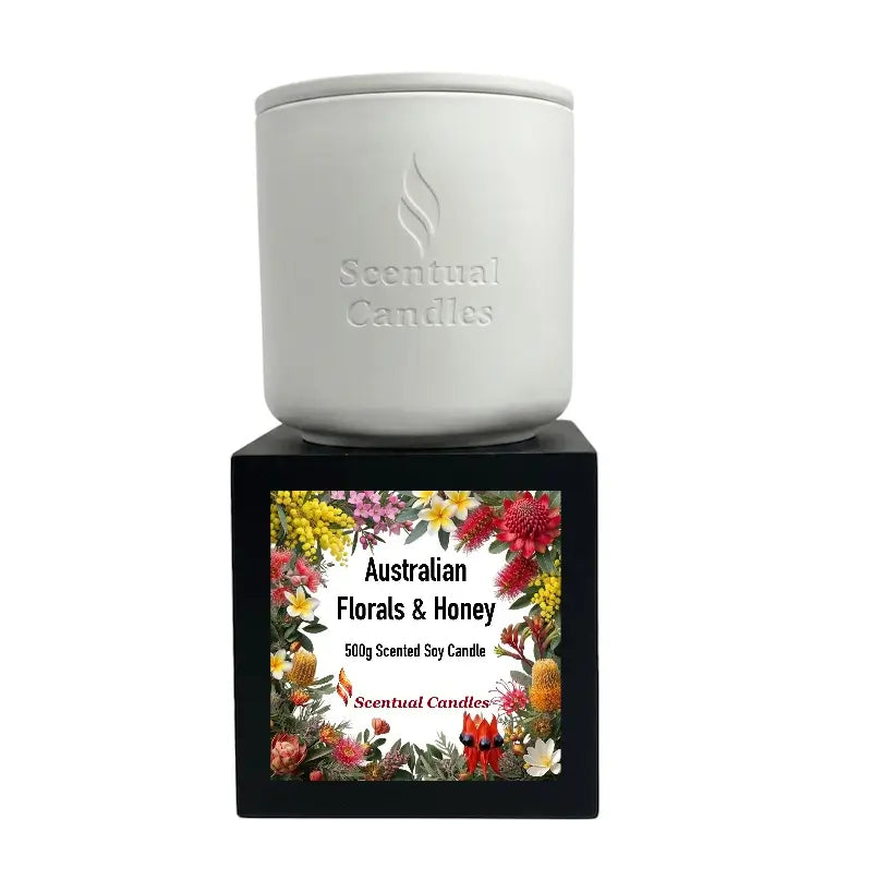 Australian Florals and Honey scented soy candle displayed in elegant packaging from Scentual Candles.