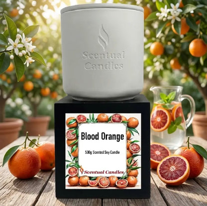 Blood Orange Candle by Scentual Candles, 500g scented soy candle in a white container with a vibrant label.