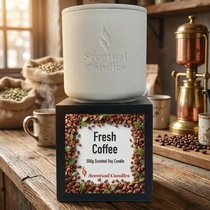 Coffee Scented Candle in a white container with a Fresh Coffee label on a black box, perfect for cozy ambiance.