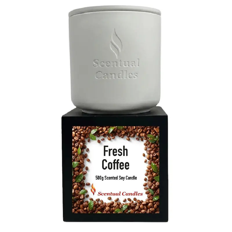 Coffee Scented Candle in a white container with a Fresh Coffee label on a black box, perfect for cozy ambiance.