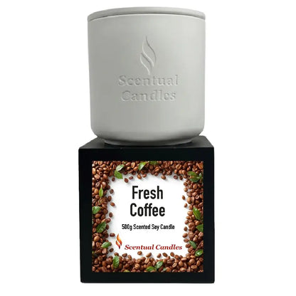 Coffee Scented Candle in a white container with a Fresh Coffee label on a black box, perfect for cozy ambiance.