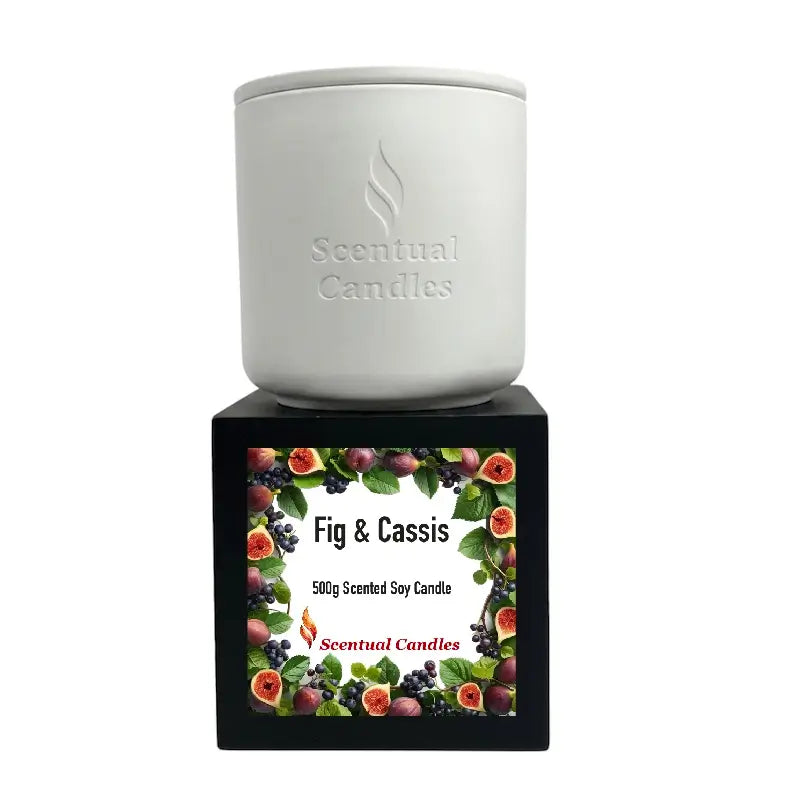 Fig and Cassis scented soy candle from Scentual Candles in a white container with a colorful label.