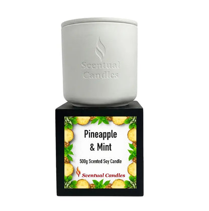 Pineapple and Mint Scented Soy Candle by Scentual Candles in a sleek white jar with a vibrant label.