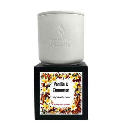 Vanilla and Cinnamon Candle - Scented Soy candle with floral design and spice accents on the packaging.