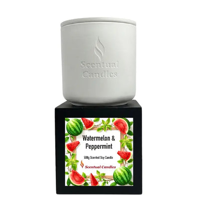 Watermelon and Peppermint Candle in a decorative soy candle holder with a vibrant label and fresh fruit design.