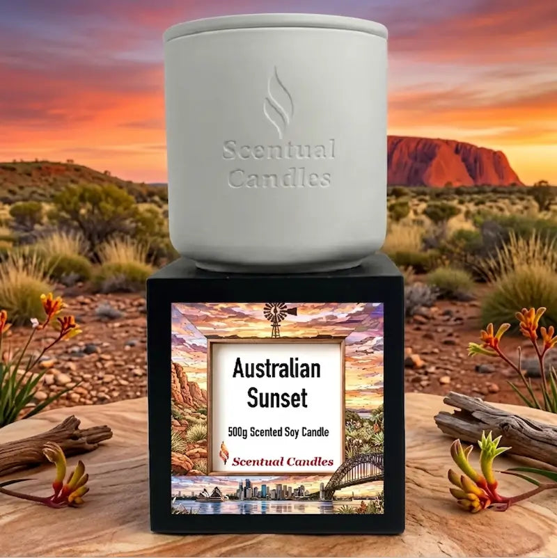 Australian Sunset scented soy candle displayed against a scenic Australian landscape background.