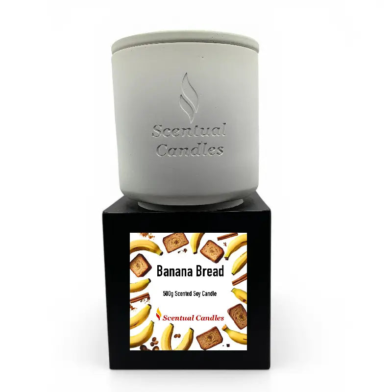 Banana Bread Candle with comforting soy scent and cozy bakery aroma in elegant packaging by Scentual Candles.