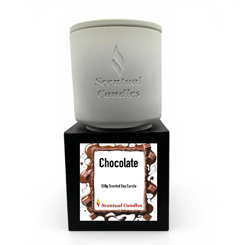Chocolate Candle in elegant white jar, Scented Soy, on black box with chocolate-themed label, luxury home decor.