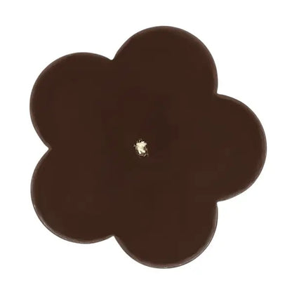 Top view of Australian Sandalwood Scented Soy Pillar Candle, flower-shaped, showcasing elegant dark brown wax with central wick.