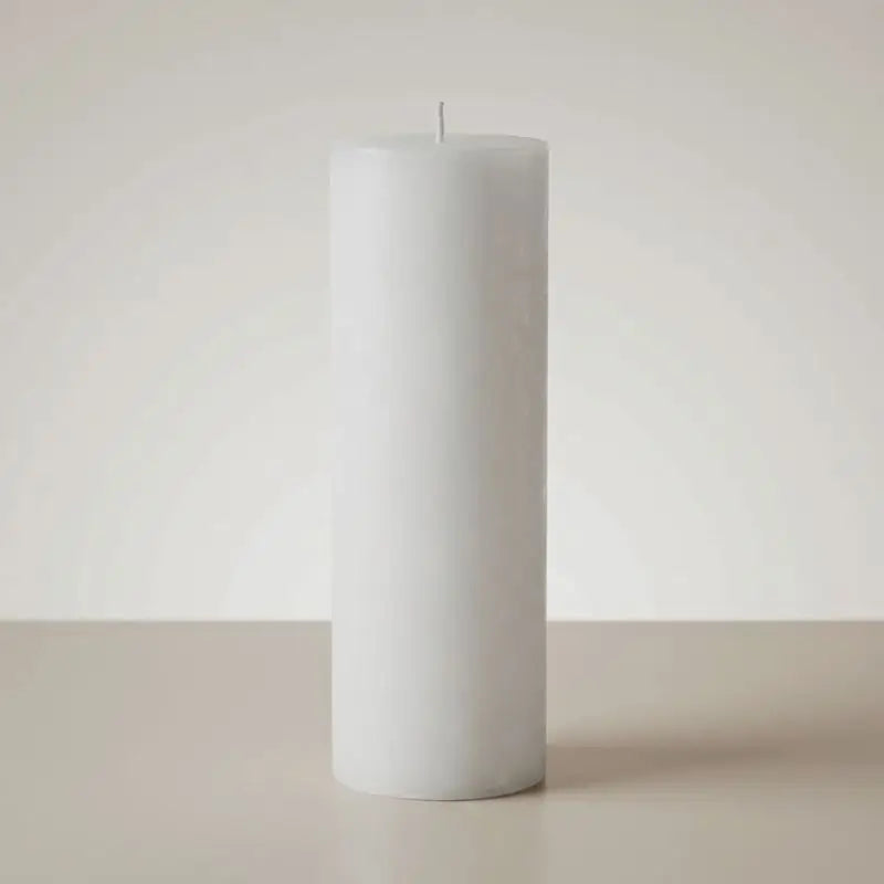 White Pillar Candles displayed on a neutral background, showcasing a clean and elegant design perfect for home decor.