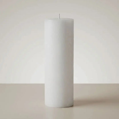 White Pillar Candles displayed on a neutral background, showcasing a clean and elegant design perfect for home decor.