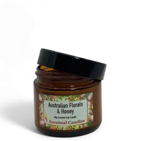 Scentual candles jar labeled 'Australian Florals & Honey' on a white background