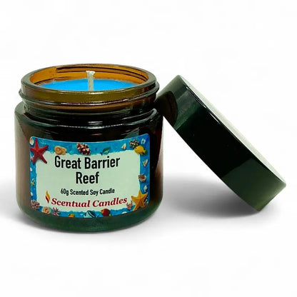 Tropical Scented Candle Great Barrier Reef in a jar with ocean-themed label and blue wax.