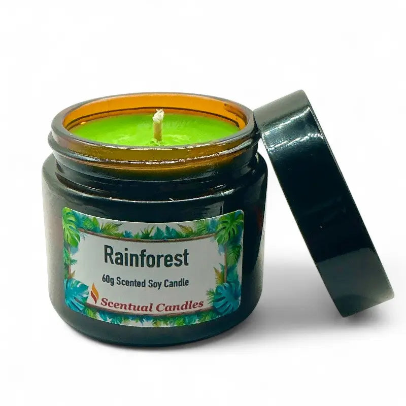 Scentual Candles Rainforest scented candle in a jar with a label on a white background