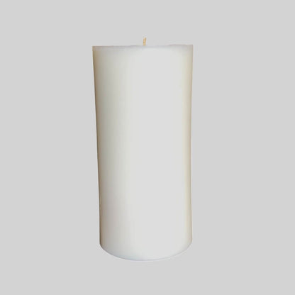 White Pillar Candles with Coconut and Lime fragrance for home decor and relaxation.
