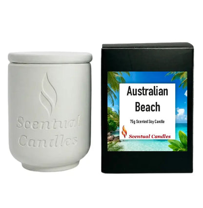 Australian Beach scented candle in a white jar next to its packaging, showcasing a coastal theme.