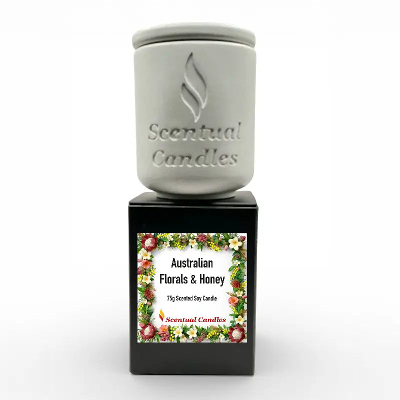 Australian Florals and Honey scented soy candle with floral design on label.