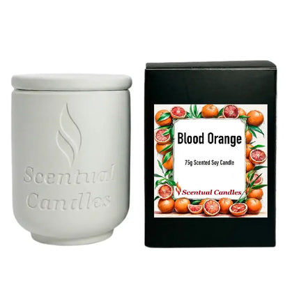 Blood Orange Candle in white ceramic jar with box packaging featuring a vibrant blood orange design.