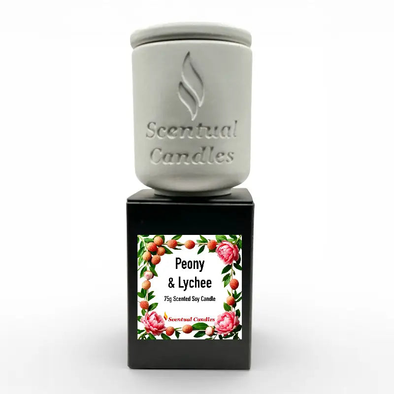 Lychee Scented Candle with peony and raspberry notes in elegant packaging