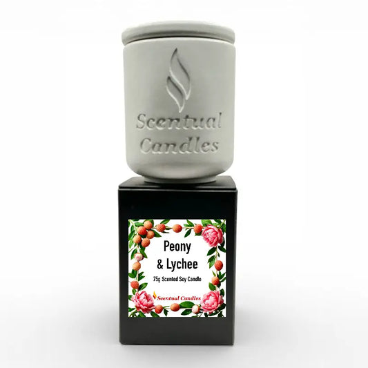 Lychee Scented Candle with peony and raspberry notes in elegant packaging