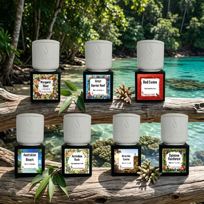 Australian Destinations Candle Set featuring Margaret River, Great Barrier Reef, Red Centre, Australian Beach, Byron Bay, and Daintree Rainforest.