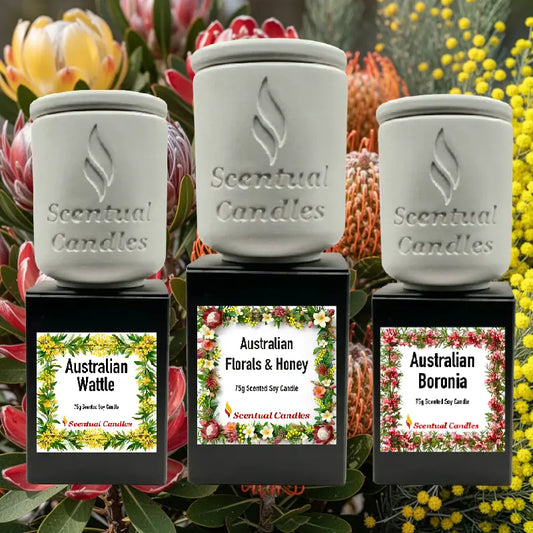 Australian Florals Candle Gift Set with three native-inspired scented candles in handcrafted vessels, displayed against floral background.